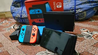 olde Nintendo switch 128gb/15 games with boxe