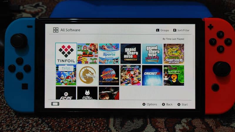 olde Nintendo switch 128gb/15 games with boxe 3