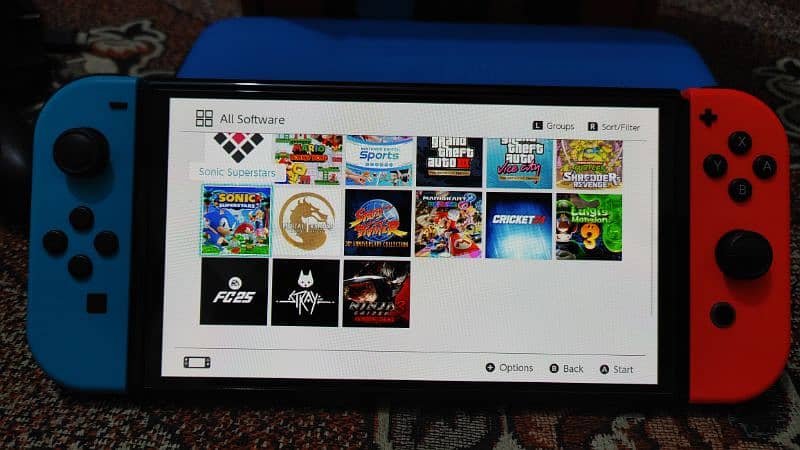 olde Nintendo switch 128gb/15 games with boxe 4