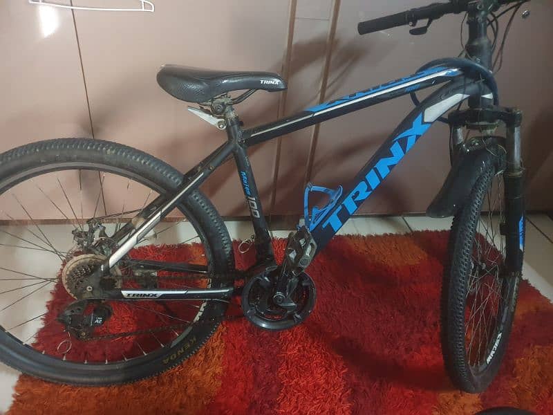 Original trinx m100 Mountain bike price negotiable 0