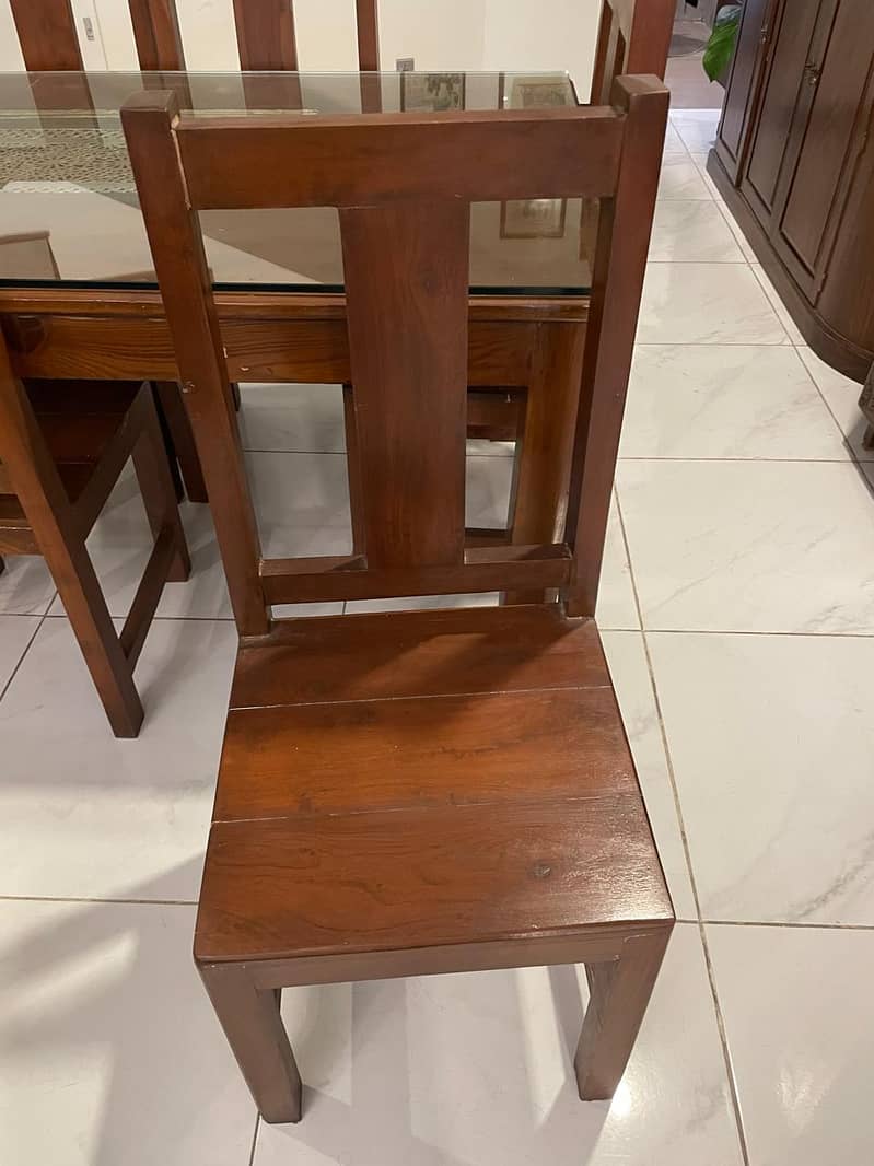 solid wood table with 6 solid wood chairs. 1