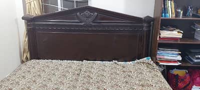 soiled wood bed