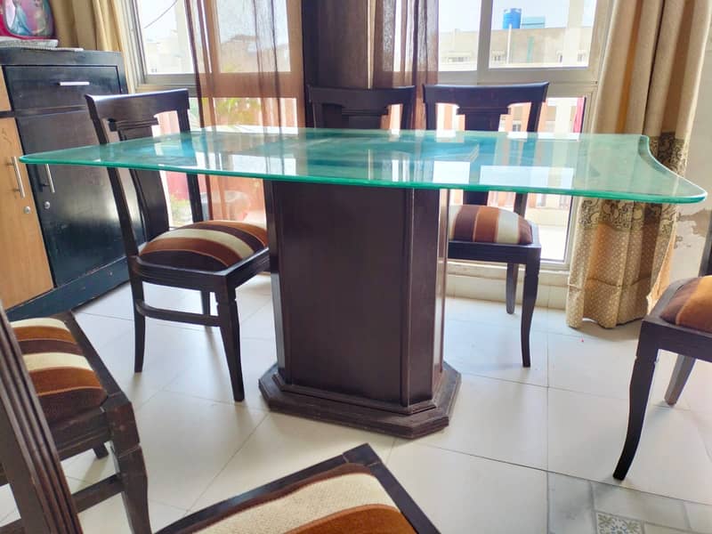 Glass Dining table with 6 wooden chairs 1