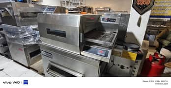 use pizza conveyor Oven just like new we hve pizza fast food machinery