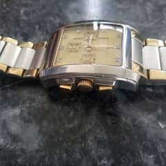 imported luxur watch  heavy weight . . two tone chain . good condition.