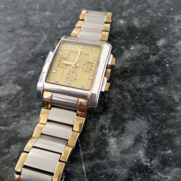 imported luxur watch . . heavy weight . . two tone chain . good condition. . 1