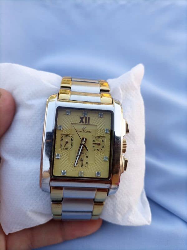 imported luxur watch . . heavy weight . . two tone chain . good condition. . 2