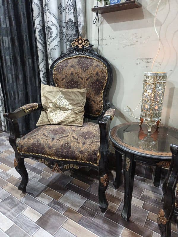 2 chairs with table 1