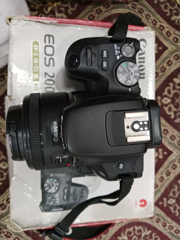 Canon 200D with Kit lens and 50mm lens and Icon tripod 7