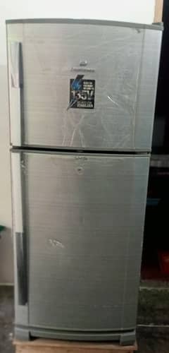 Old fridge for sale condition well ha aur Saath mein fridge stand bhi