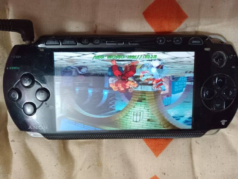 PSP Model 1004 in running condition. 1