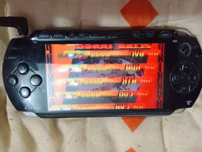 PSP Model 1004 in running condition. 4