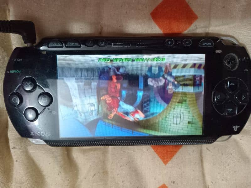 PSP Model 1004 in running condition. 5