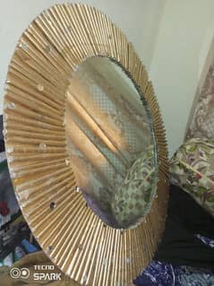 beautifully hand-crafted piece of art. Round circular decorated mirror