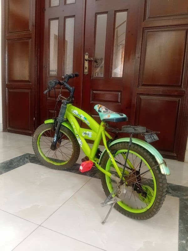 green kids bicycle 1