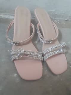 pink heels imported from Bahrain made in China