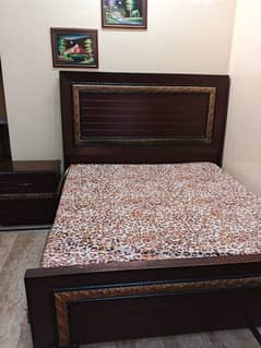 bed set with side table and dressing. .