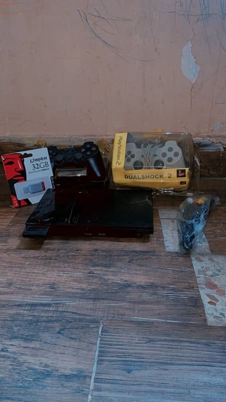 PlayStation 2 Eidi Offer Complete Deal With games install 2 controll 0