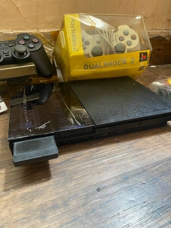 PlayStation 2 Eidi Offer Complete Deal With games install 2 controll 7