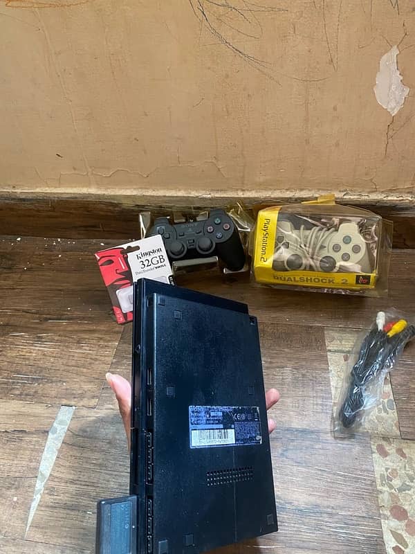 PlayStation 2 Eidi Offer Complete Deal With games install 2 controll 15