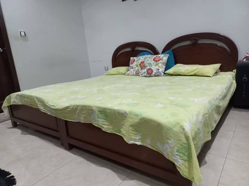 2 wooden single beds for sale 0