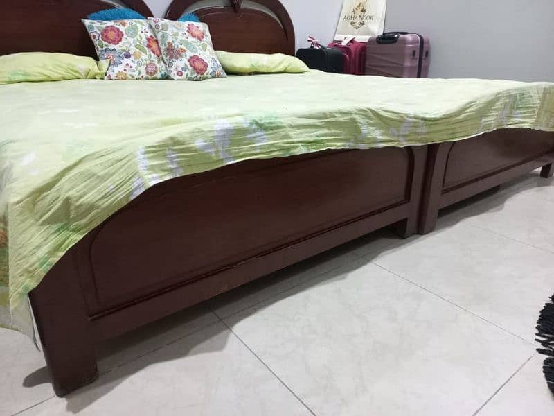 2 wooden single beds for sale 5