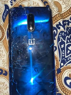 One Plus 7 Back glass broken panel change for sale just in 23k