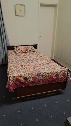 "Solid Wooden Bed for Sale – Excellent Condition"