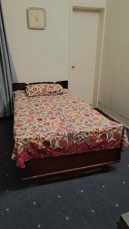 "Solid Wooden Bed for Sale – Excellent Condition" 0