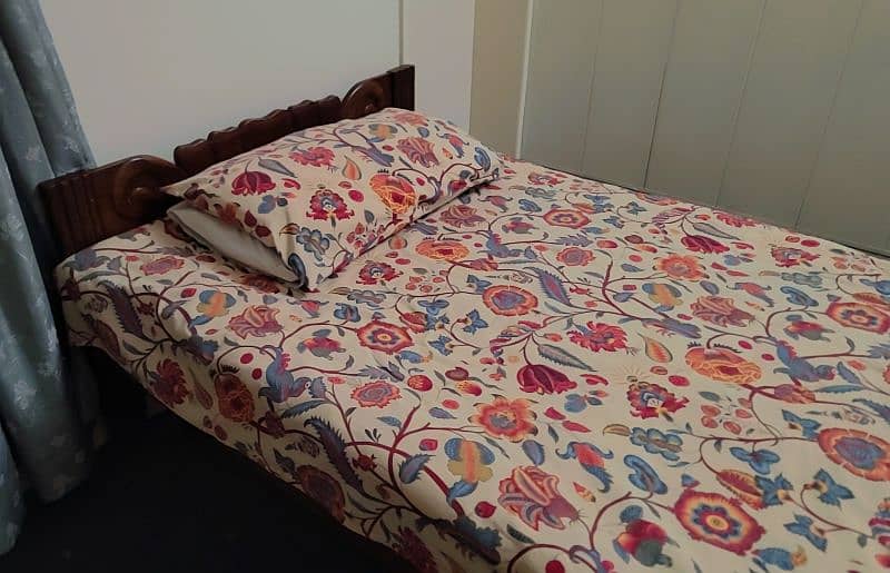 "Solid Wooden Bed for Sale – Excellent Condition" 1