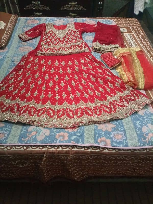 Bridal lehnga, only 2 hours used,bridal purse included 2