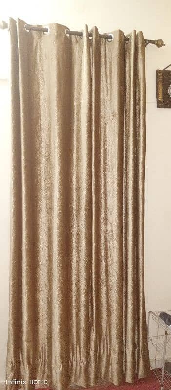 Used 4 Golden brown curtains 3