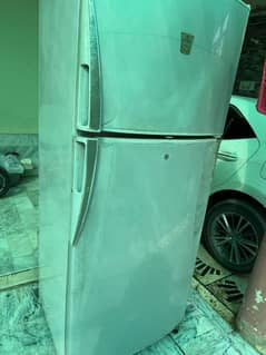 Dawlance fridge with original compress good condition