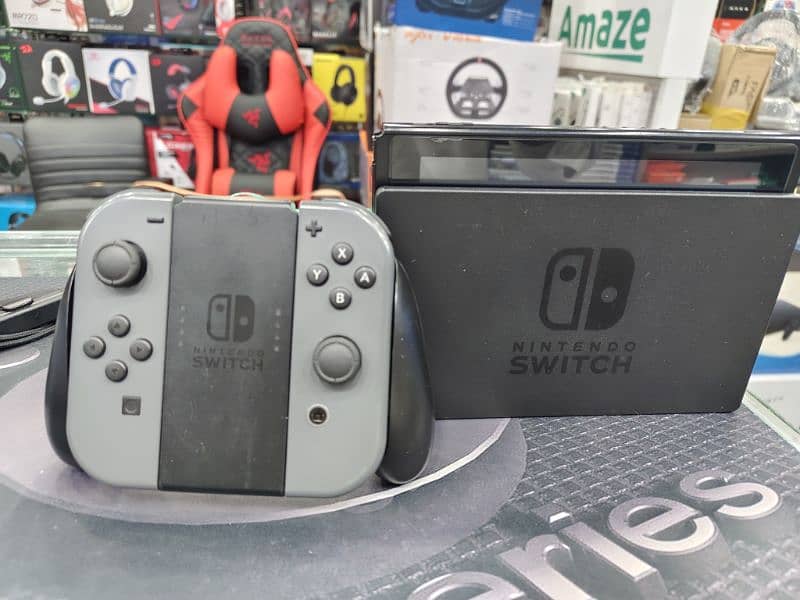 NITENDO SWITCH COMPLETE UNIT WITH ACCESSORIES 0