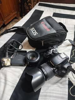 canon 600d with 18/55mm lens & 50mm Dual lens.