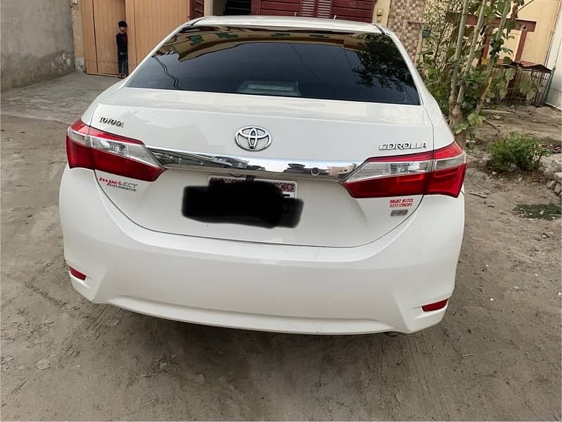 Toyota Corolla GLI 2015 model white color 1