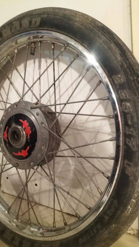 CD 70 front alloy rim and tyre 0