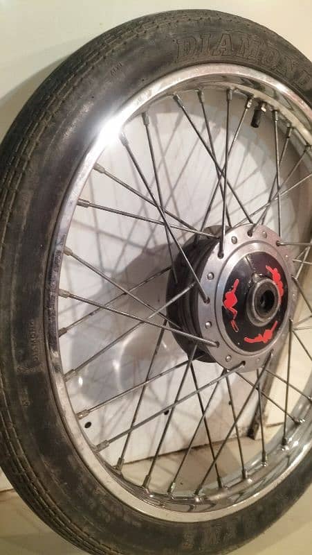 CD 70 front alloy rim and tyre 1