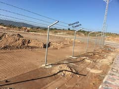 installation of Concertina Barbed Razor Wire Chainlink Fence Mesh