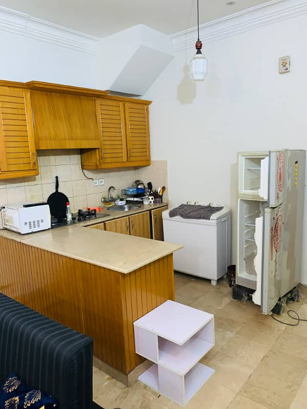 F-11 Markaz 1 Bedroom Tv Lounge Kitchen Fully Furnished Apartment Available For Rent 1