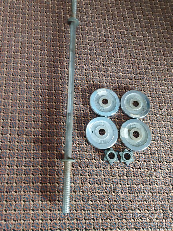 used weight plates ,rods , adjustable rods . dumbbell rod 0