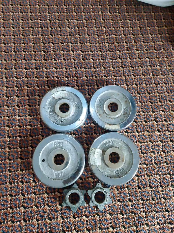 used weight plates ,rods , adjustable rods . dumbbell rod 3