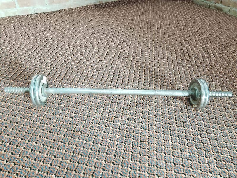 used weight plates ,rods , adjustable rods . dumbbell rod 4