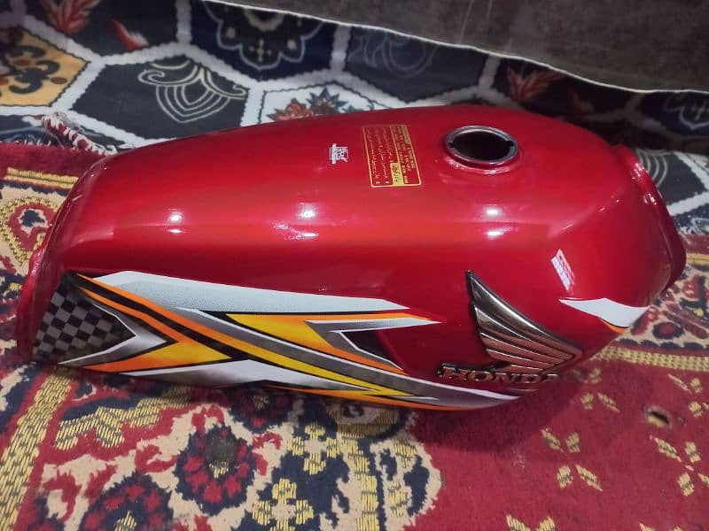 honda 125 orignal tenki tappe 1