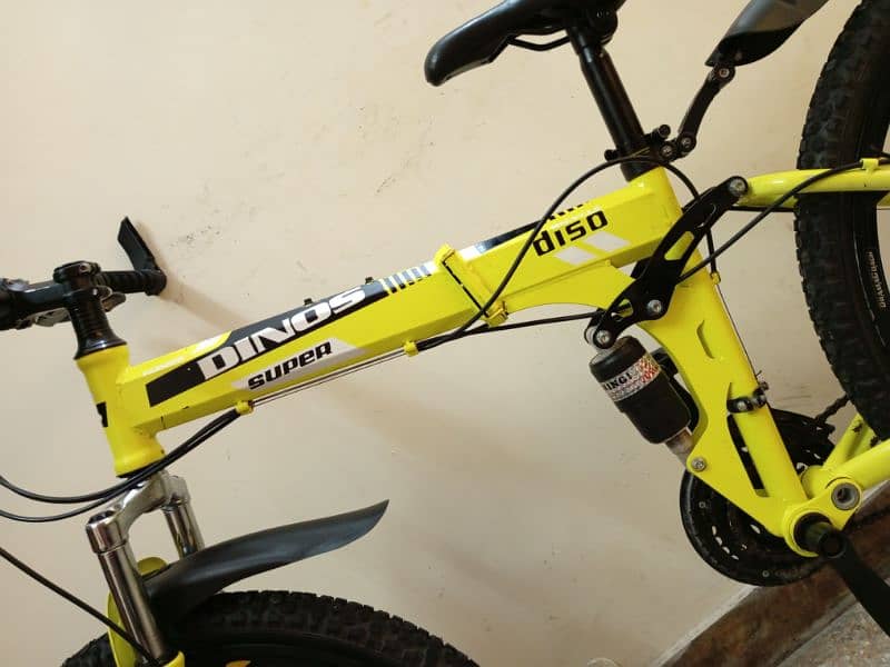 26 INCH IMPORTED (FOLDING) GEAR CYCLE 6 MONTH USED 03265153155 16