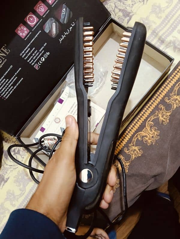 Hair straightener (Steam Comb) 2