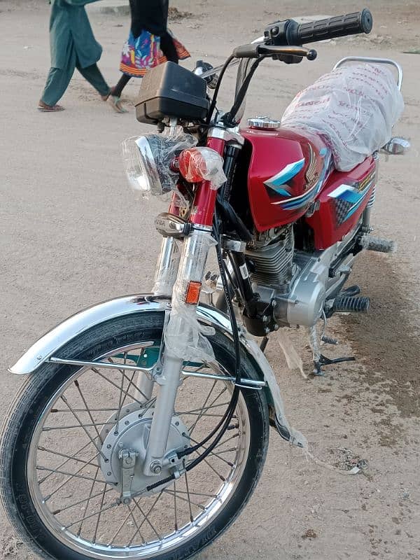 Honda 125 new condition 900 km genion drive 2