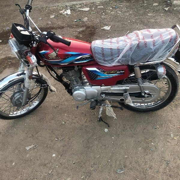 Honda 125 new condition 900 km genion drive 10