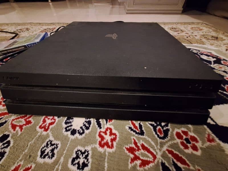 ps4 pro 1 tb for sale with 2 original controllers 3