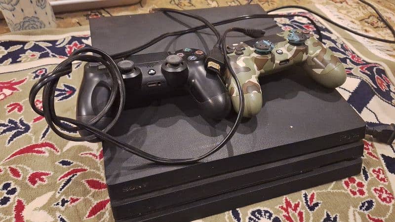 ps4 pro 1 tb for sale with 2 original controllers 6